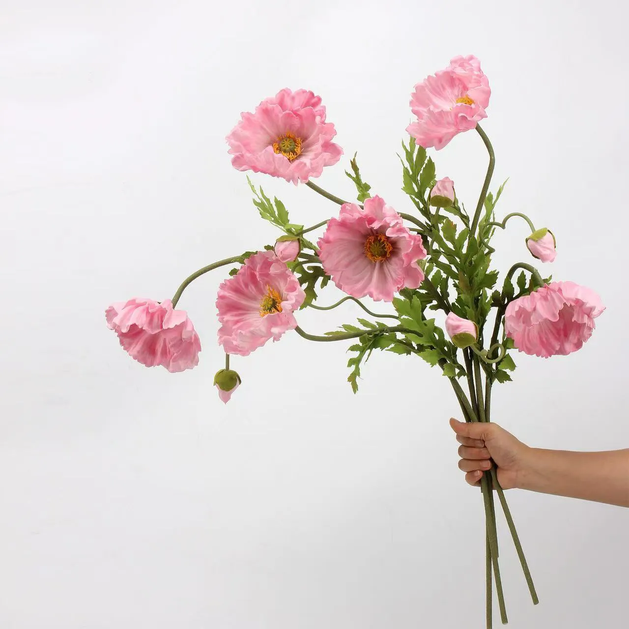 The application of silk flower arrangements for gravesites